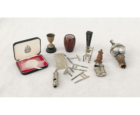 An assortment of items including silver, MG gear knob, ACME whistle, Isle of Man commemorative coin etc.