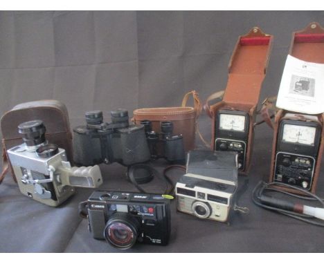 Two Analytical Measurement, AM Analytical Pocket PH meters. A Canon AF35M auto focus camera, a vintage Kodak Instamatic 204 C