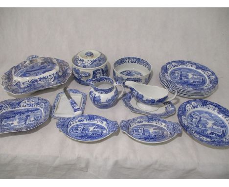 A collection of Spode Blue Italian including six dinner plates, gravy boat, various bowls/dishes, jug etc - all black stamp m