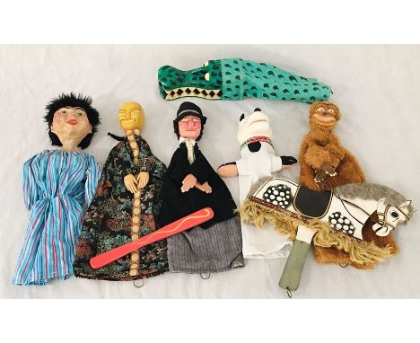 A collection of Punch and Judy puppets by Chris Whitehouse and Rosemary Perkins including a paper mache Pretty Polly and croc