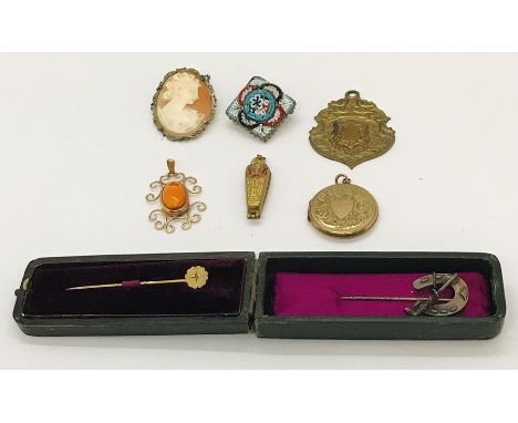 A small collection of costume jewellery including a silver tie pin, micro mosaic brooch, cameo,etc.