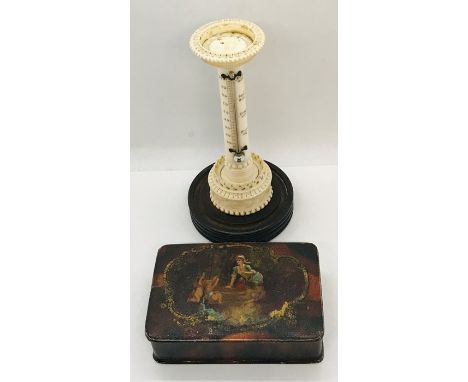 A turn of the Century ivory thermometer in the form of a column ( pincushion finial missing) along with a hand painted paperm