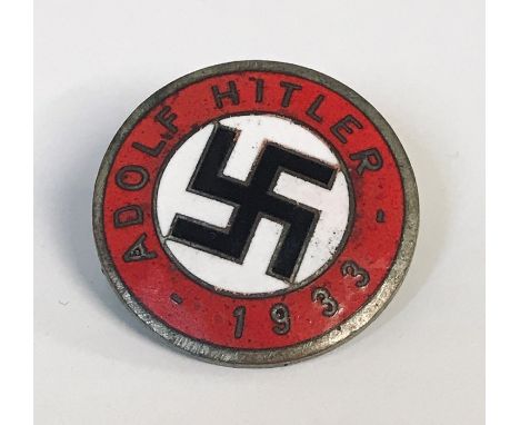 A pre Second World War 1930's German Third Reich NSDAP Nazi Party members enamel badge. Notation to front within red enamel r