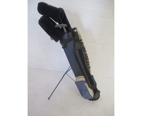 A set of R H Slazenger mark two Johnny Miller golf clubs in a Head carry bag. Clubs include woods one, three and five, Irons 