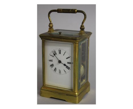 A GOOD 19TH CENTURY FRENCH BRASS REPEATER CARRIAGE CLOCK.  5ins high.