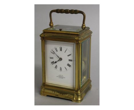 A GOOD 19TH CENTURY FRENCH BRASS REPEATER CARRIAGE CLOCK, retailed by CONNELL, 83 Cheapside, LONDON.  5ins high.