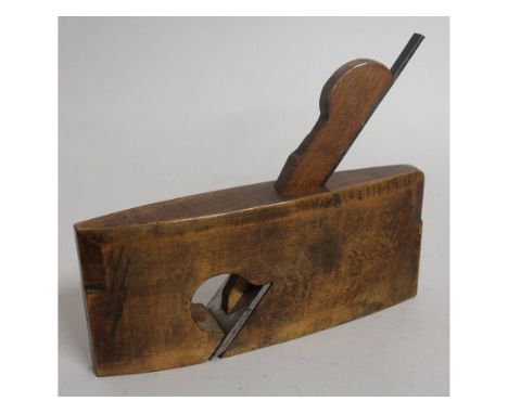 A compass smoothing plane with steel adjuster by Buck, Edgeware Road, London.