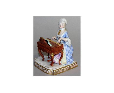A MEISSEN SENSES GROUP, "SOUND", a seated lady playing a piano. Cross swords mark in blue.