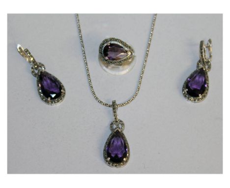 A SILVER MARCASITE AND AMETHYST THREE PIECE SET, pair of earrings, ring and pendant & chain.