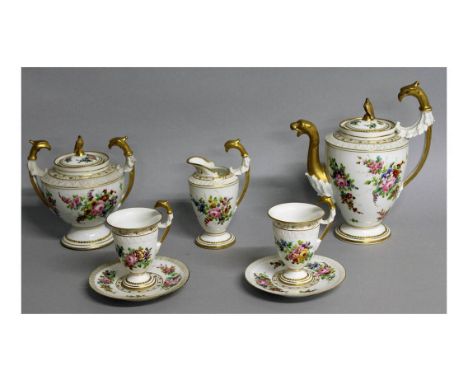 A SEVRES SEVEN PIECE PORCELAIN TEA SET, with gilt lion and griffin mounts and painted with flowers, comprising teapot, sugar 