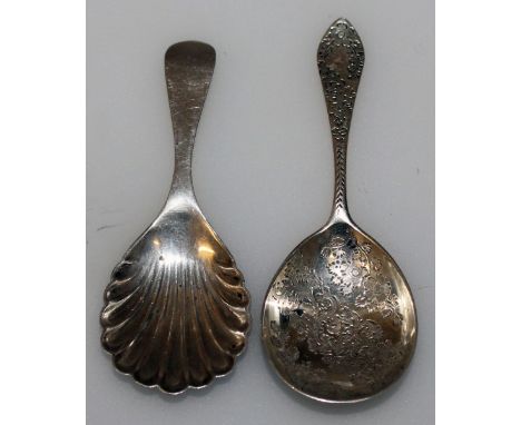 A VICTORIAN ENGRAVED CADDY SPOON, London 1891 and a SHELL BOWL CADDY SPOON, Birmingham 1945 (2).