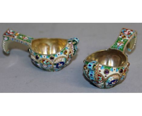 A GOOD PAIR OF RUSSIAN SILVER GILT AND ENAMEL KOVSH.