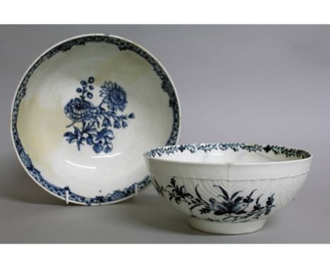 AN 18TH CENTURY LOWESTOFT PUNCH BOWL decorated with flowers in under-glaze blue and a Worcester bowl herringbone moulded, dec