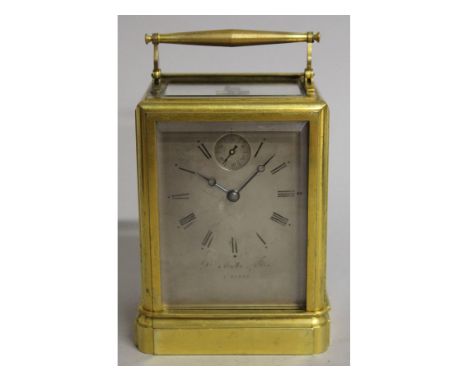 A VERY GOOD EARLY 19TH CENTURY FRENCH BRASS CARRIAGE CLOCK by D. MOTTU ET FILS OF PARIS, with silvered dial and small seconds