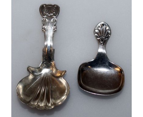 A SHELL HANDLE CADDY SPOON, Sheffield 1925 and ANOTHER, Birmingham 1821 (2).