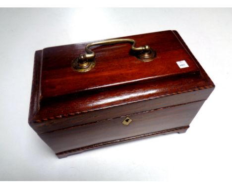 A George III inlaid mahogany tea caddy with fitted interior 