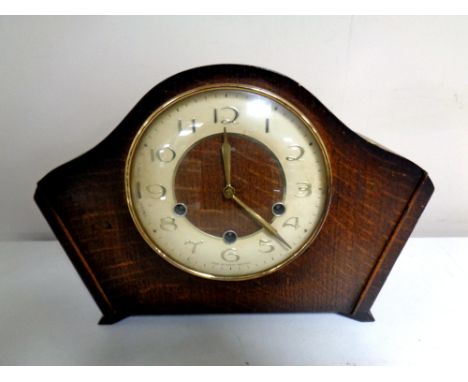 An early 20th century Smiths oak mantel clock   