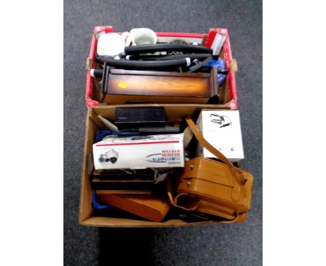 Two boxes containing silver plated rose bowl, contemporary wall clock, china, vintage cash tin, electricals etc 