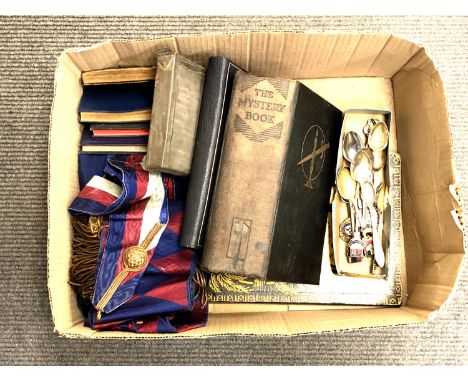 A box containing Masonic sash and apron, Masonic books, 19th century indenture in metal tin, one volume The Mystery Book and 