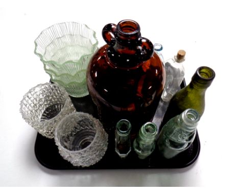 A tray containing bottles bearing various names including one bottle marked W B Reid and Co. Newcastle upon Tyne, together wi
