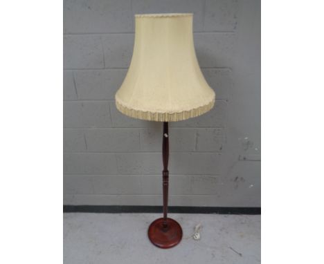 A standard lamp and shade 