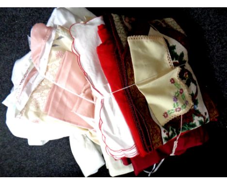 A box containing duvet sets and pillow cases, three pairs of curtains, table cloth, napkins, table runner etc, together with 
