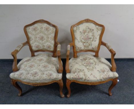 A pair of French beech framed salon chairs in studded tapestry fabric 