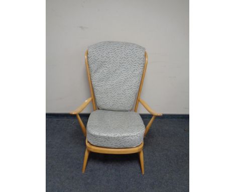 An Ercol high back armchair 