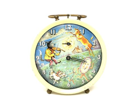 A mid 20th century Smith alarm clock, cow jumps over the moon  