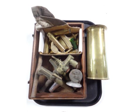 A tray containing trench art vase, brass taps, brass door knocker, ammunition casings etc 