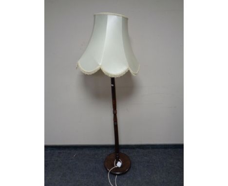 A turned beech standard lamp 