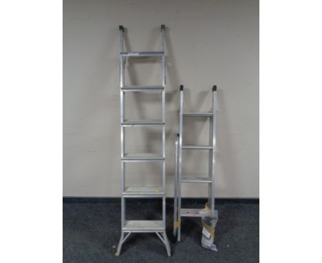 An aluminium folding ladder together with a similar extension ladder  