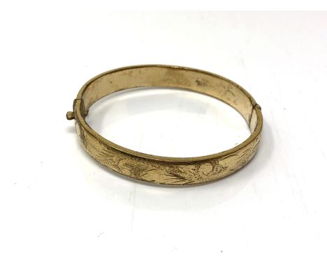 A rolled gold vintage bangle 