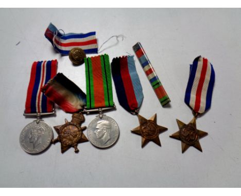 A group of First and Second World War medals including a 1914-15 Star awarded to R-10854 PTE T. A. Smallwood K. R. Rif : 0  