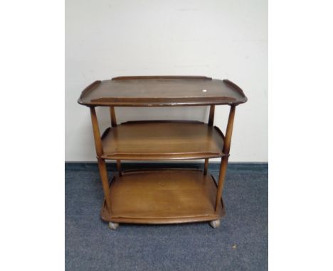 An Ercol three tier drinks trolley 