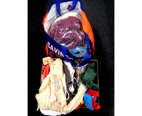 A box containing a quantity of flags on poles together with a quantity of knitted goods, polystyrene mannequin heads, bag of 