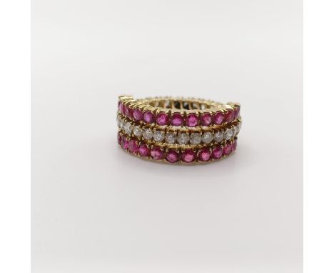 A diamond and red stone adjustable double eternity ring, ring size K, with a vintage jewellery boxuntested metal 
