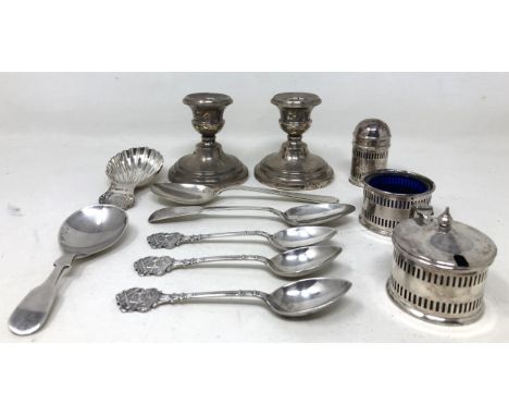 A Georgian style silver caddy spoon, another, assorted teaspoons, various dates and marks, 3.4 ozt, a three piece cruet and a