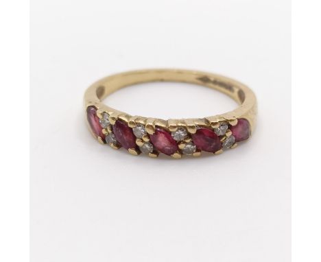 A 9ct gold, garnet and white stone ring, ring size K 