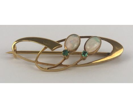 A 9ct gold, opal and green stone brooch 