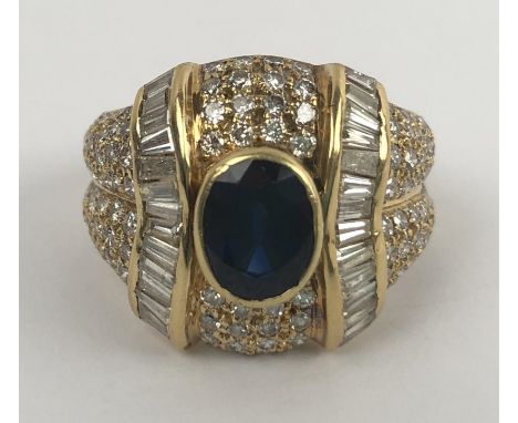 An 18ct gold, sapphire and diamond ring, ring size K 