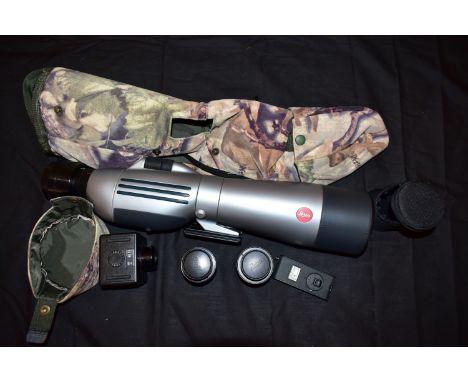 A LEICA APO-TELEVID 77 SPOTTING SCOPE fitted with a T77 20x-60x eyepiece along with a T77 40x-ww and a 8 20xww eyepieces, a s