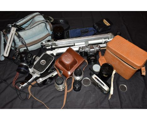 A TRAY CONTAINING CAMERA EQUIPMENT including a Zenit 3M fitted with a Helios 44 58mm f2 lens with leather case, a MIR-1 37mm 