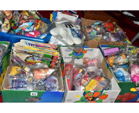 A COLLECTION OF McDONALDS PLASTIC TOYS, majority still sealed in original packaging, assorted themes to include various Disne