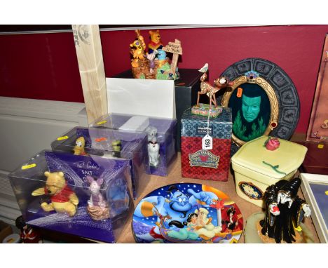 A GROUP OF DISNEY CHARACTER ITEMS, comprising a boxed Enesco Disney Traditions figure 'Wonder of Spring' (Bambi), four boxed 