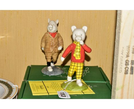 A PAIR OF BOXED ROYAL DOULTON BESWICK LIMITED EDITION RUPERT THE BEAR FIGURES, celebrating Ruperts first appearance in the Da