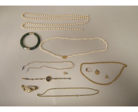 Items of personal ornament: to include a jade coloured, hinged bangle; and a gold plated belcher link neckchain 