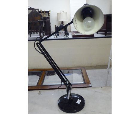 A modern Anglepoise style lamp 