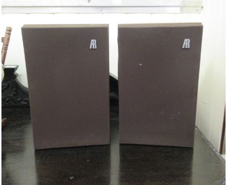 A pair of Aruko speakers, in teak effect cases, model no. 02948 and 03402&nbsp; 14"h&nbsp; 9"w 