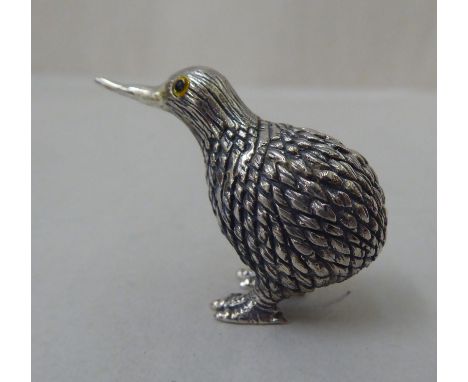 A Sterling silver miniature model bird, a standing kiwi 
